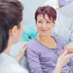 care for your dentures, denture maintenance, oral hygiene, denture cleaning, denture storage, dental care, Austin family dentist, denture handling, oral health, denture care tips