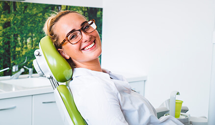 smiling woman at the dentist