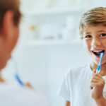 encourage kids to brush, children's dental care, brushing tips for kids, oral hygiene habits, Balcones Family Dental, Austin dentist, cavity prevention for kids