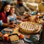 family eating thanksgiving dinner, how holidays affects your smile