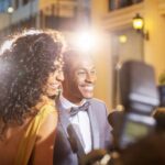Couple smiling on the red carpet
