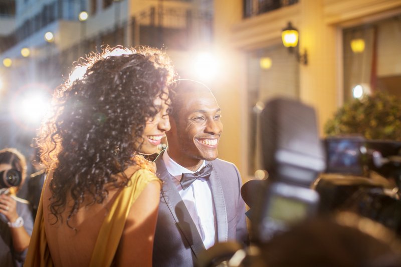 Couple smiling on the red carpet