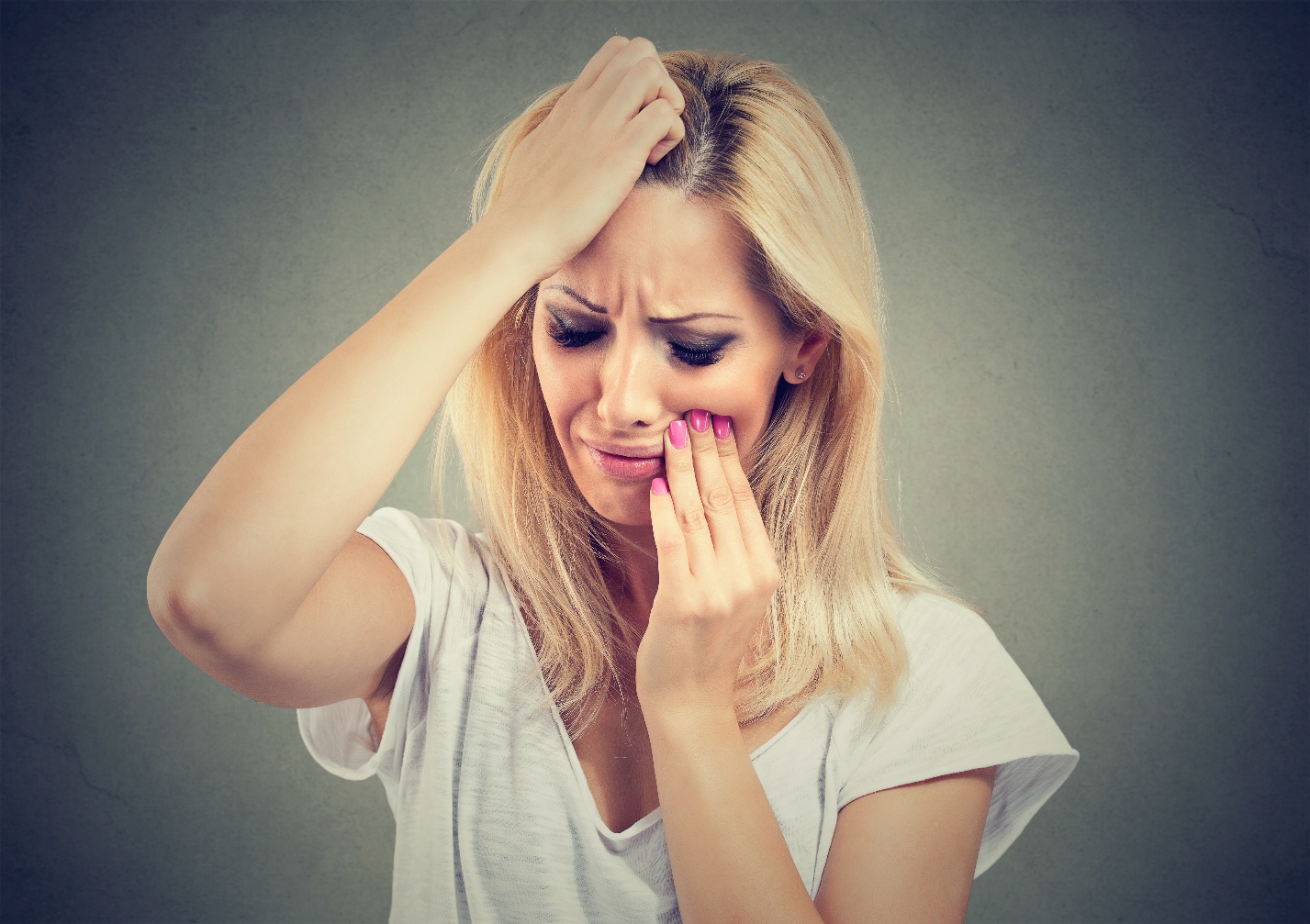 Woman in distress over toothache.